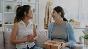 Women exchanging gifts