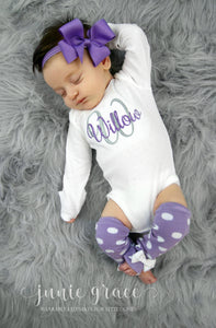 Baby girl Willow in her personalized one piece romper and matching polka dot leg warmers and bow headband